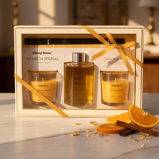 Danny Home Arancia Spezial luxury candle and diffuser gift set in gold ribbon box on marble with orange and spice